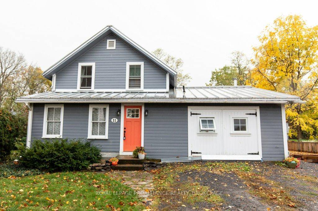 Located in the heart of Marysville, Wolfe Island, on a large village lot you'll find this charming, character filled, century home.