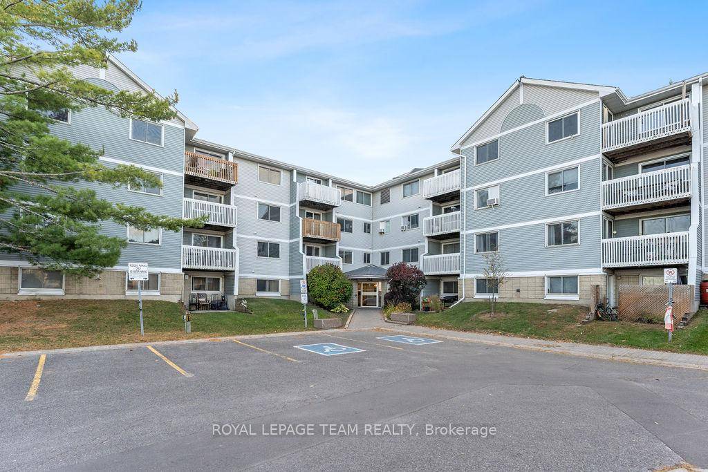 Stylish, sun filled top floor condo in quiet 4 storey building with elevator in Viewmount Woods !