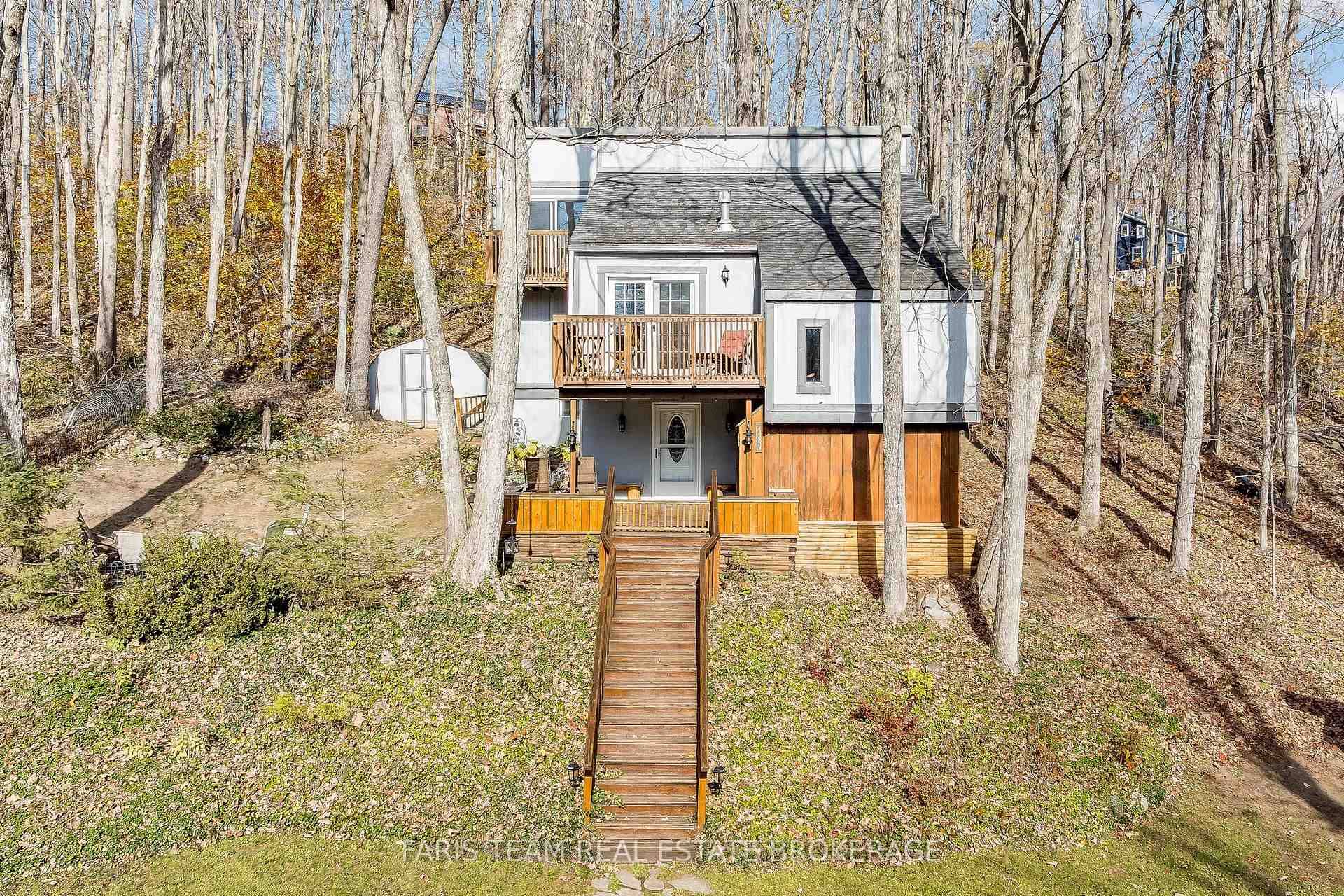 Top 5 Reasons You Will Love This Home 1 Established in the peaceful beauty of Sugarbush, this home is surrounded by towering trees and tranquil nature, offering a true escape ...