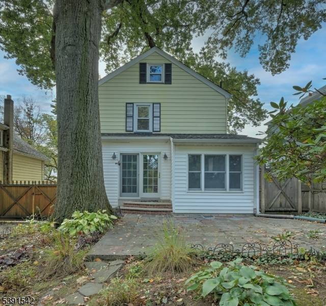 Charming Brookdale Colonial, ideally located and filled with warmth and thoughtful updates.