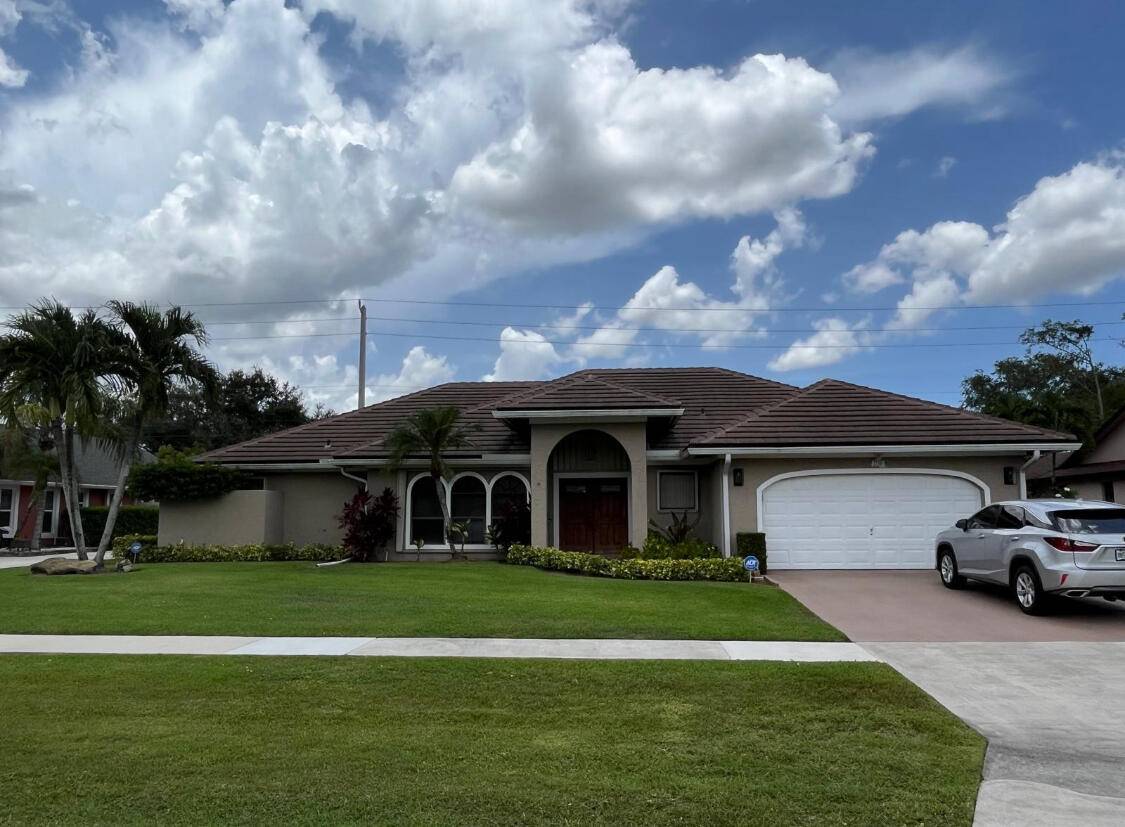 Beautiful upgraded single family one story, four bedroom, 3 1 2 bath pool home located in desirable Wellington.