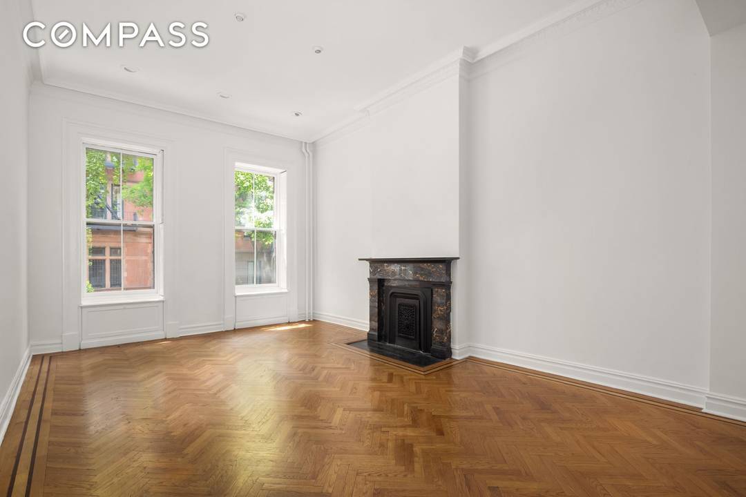 57 West 9th Street is a 22 1 4 foot wide, three family residence primed for conversion back to single family use.