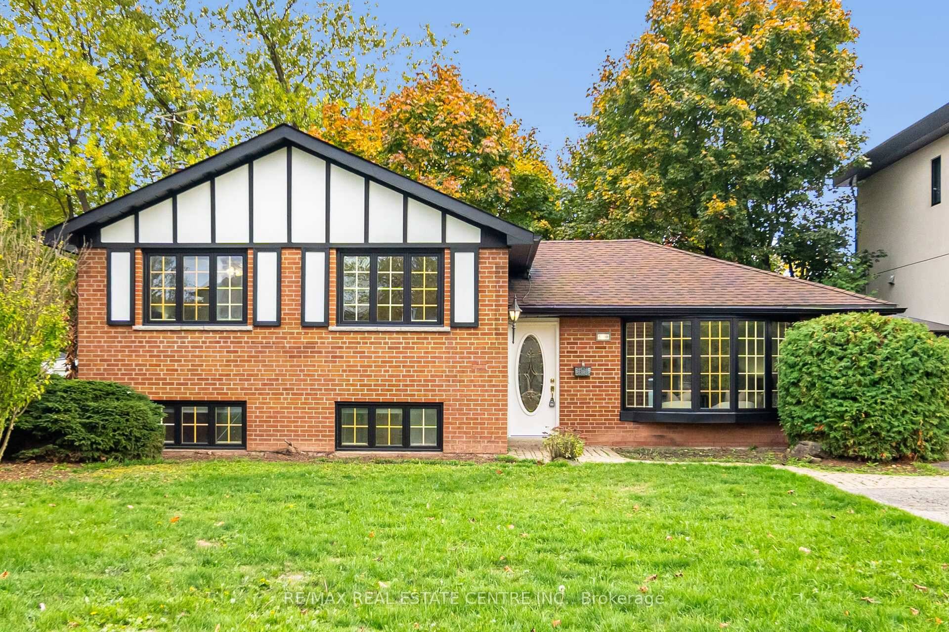 Welcome to this stunning 3 level side split, nestled in the heart of the highly desirable Elizabeth Gardens neighborhood.