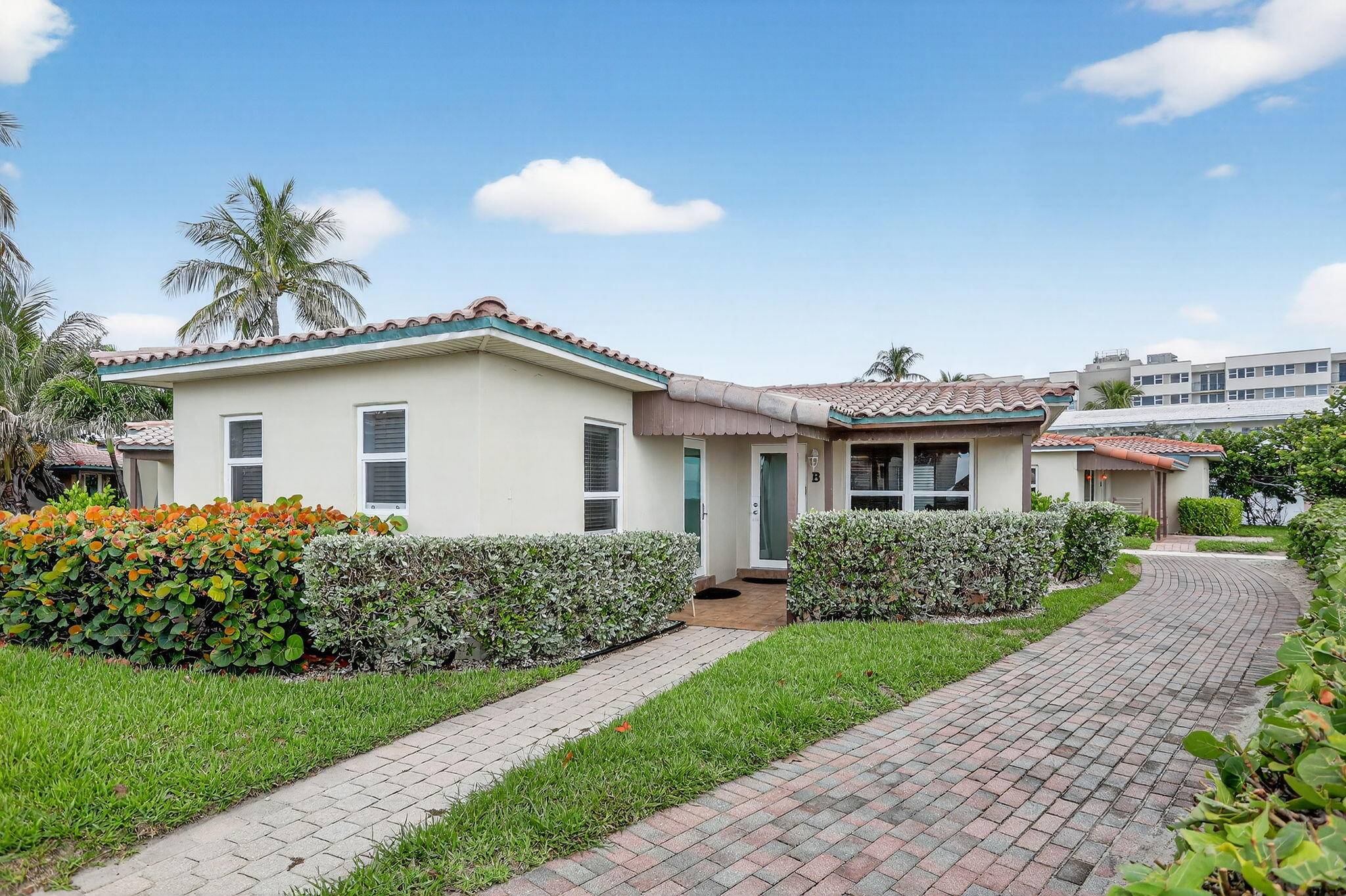 A true gem on Hillsboro Mile featuring a 2 2 beach villa just steps to the Atlantic ocean.