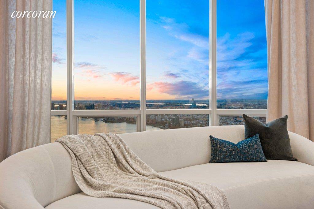 DOUBLE HEIGHT DRAMA WITH SWEEPING VIEWS OF THE HUDSON RIVER FROM EVERY ROOM.