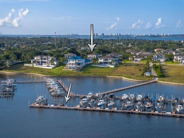 Coastal luxury meets boating convenience in the gated waterfront community of Langford Landing.