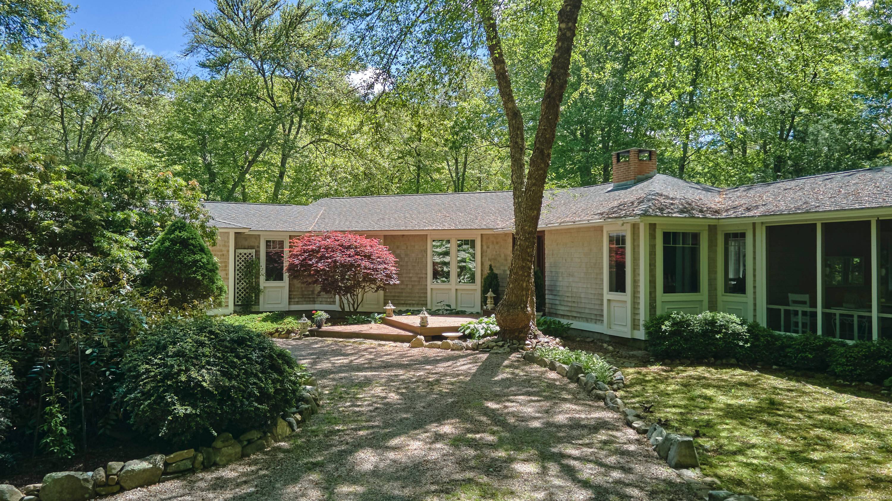This marvelous single level house is nestled nicely on 1.