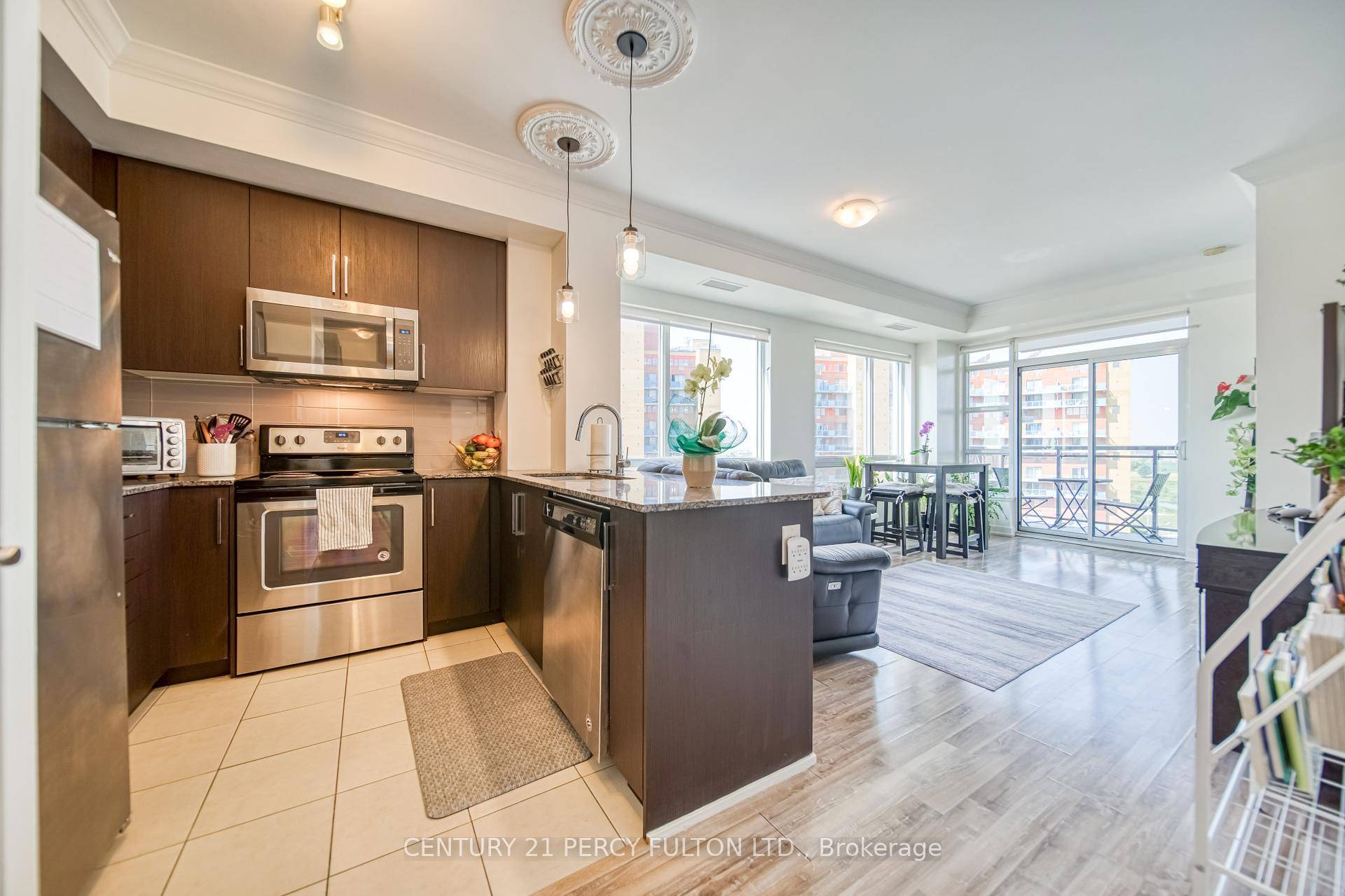 Welcome to this large 1 bed plus den, sun filled corner unit over 750 sqft !
