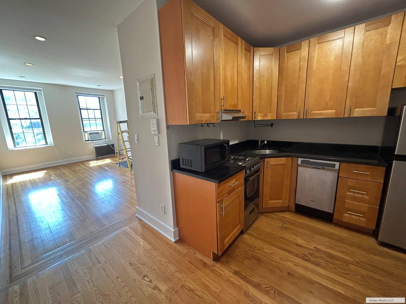 Studio West 8th Street 6th Avenue HUGE, Bright Studio Approx 400SF of living area with huge living room featuring hardwood floors, beautiful fireplace and mantle, 2 gorgeous south facing windows ...