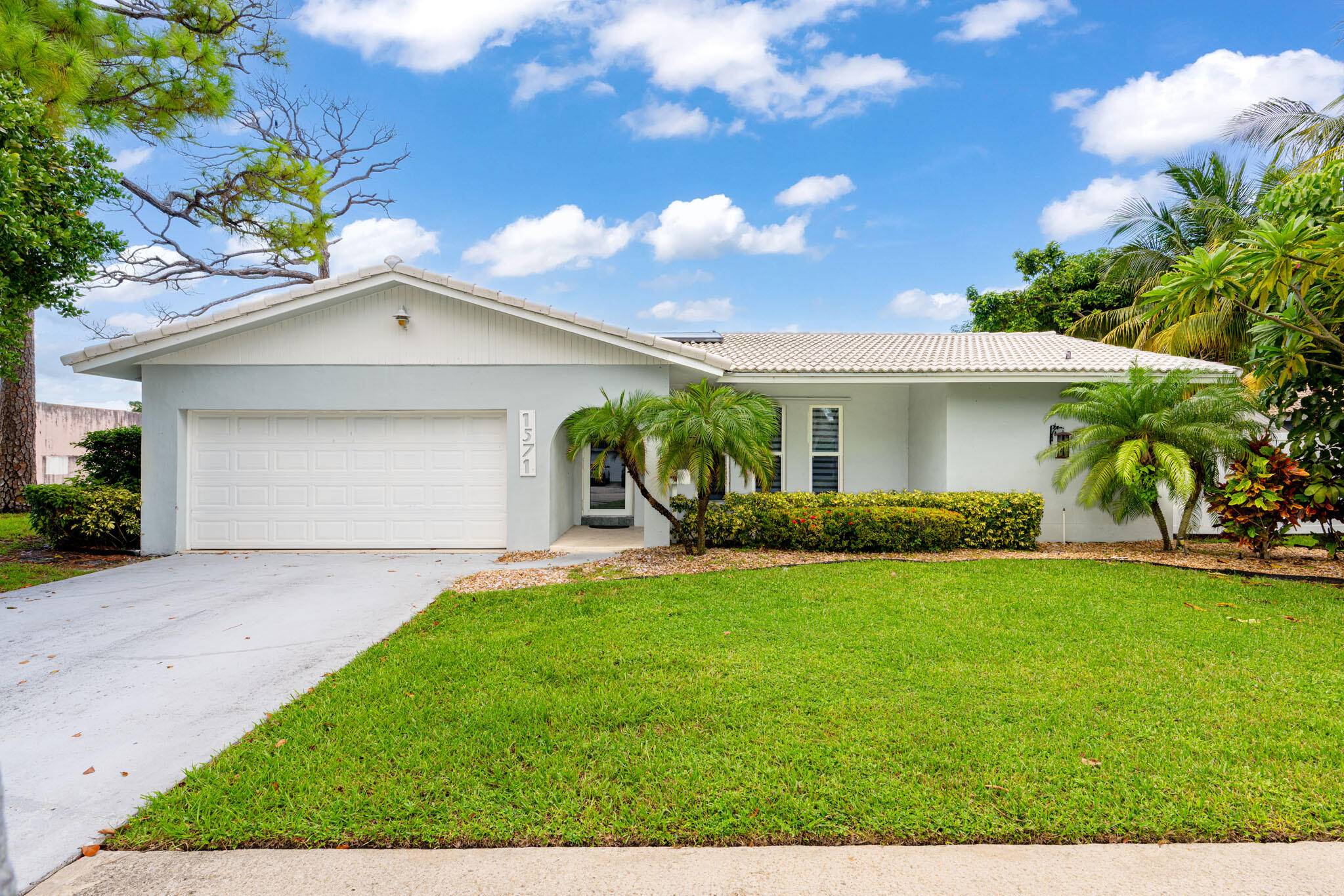 Nestled in the highly sought after community of Boca Raton Square, this home is a true gem offering both style and function.