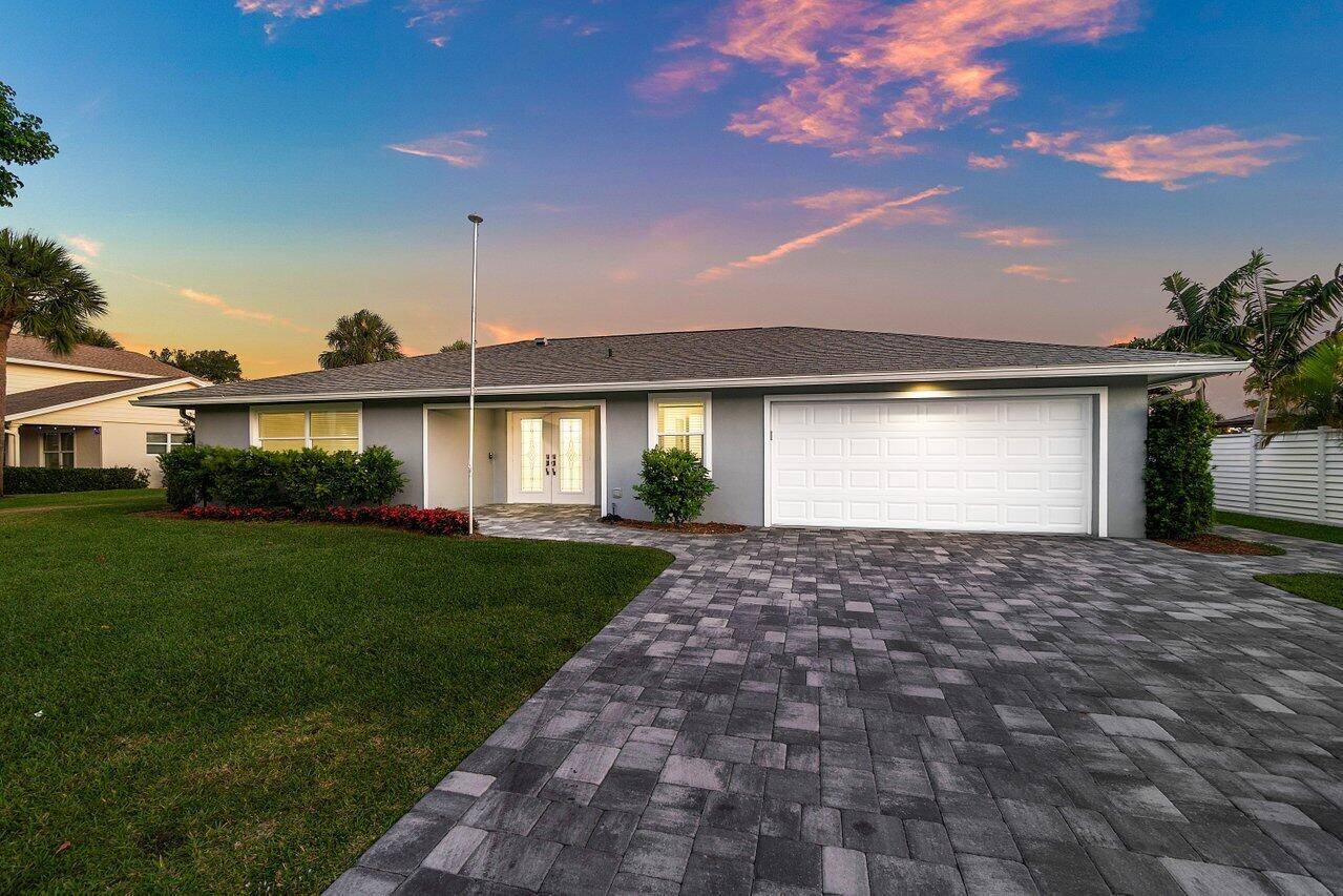 Nestled within the sought after, gated community of Cypress Creek, this impeccably updated 3 bedroom, 2 bathroom residence rests on a generous 1 3 acre lot and exudes timeless elegance ...