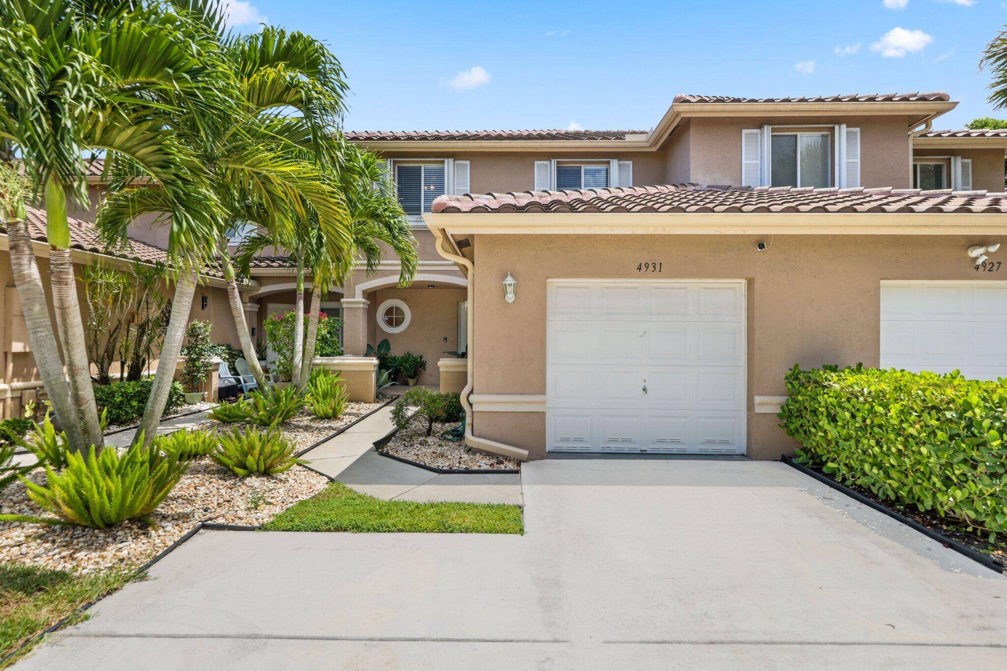 Welcome to 4931 Pinemore Lane in Lake Worth !