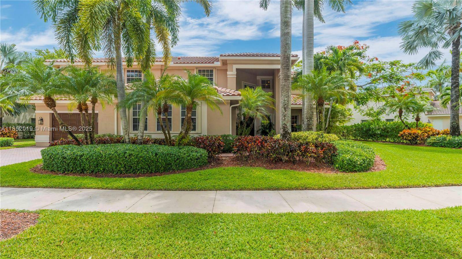 Stunning 5BR, 4. 5BA home with 3 car garage and an office in Weston s sought after Savanna community.