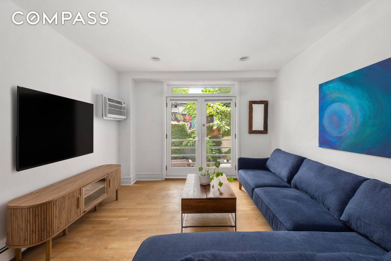 Make your home in the heart of Williamsburg in this turnkey two bedroom, two bathroom condominium featuring a wonderful open layout, lovely finishes and a Juliet balcony.