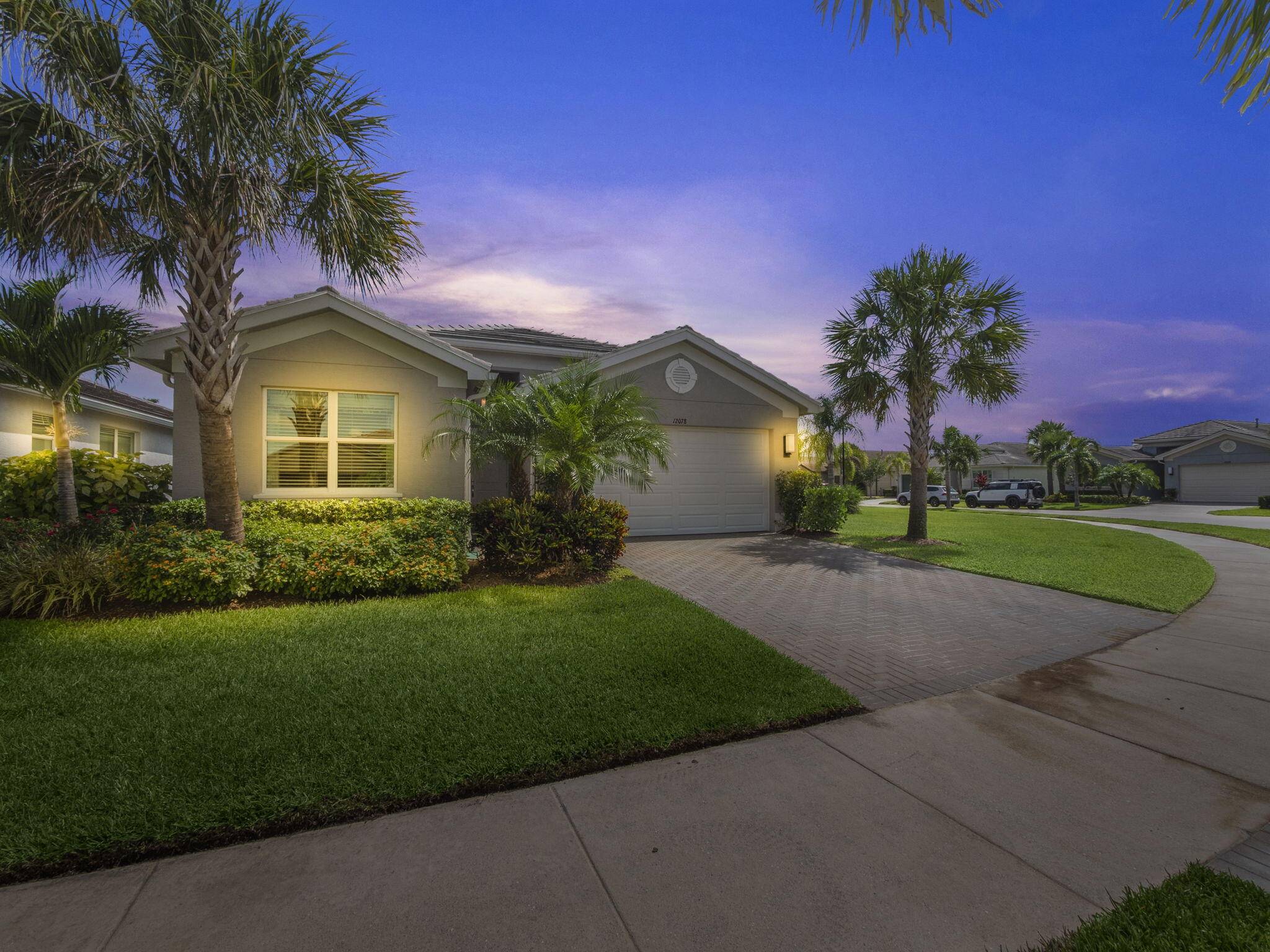 BIG Corner lot with this home in Valencia Cay at Riverland !