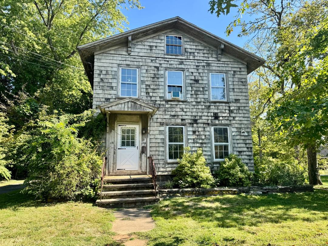 Exceptional Investment Opportunity Prime Guilford Location Just steps from the vibrant Guilford Green, this historic multifamily property features two spacious 2 bedroom, 1 bathroom units on a level 0.