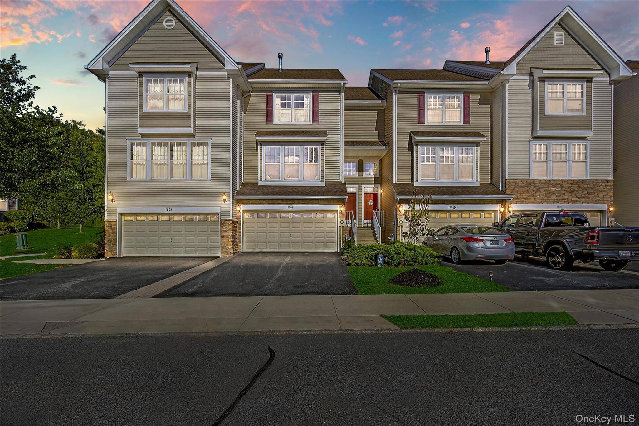 Welcome to this light filled, meticulously maintained townhouse in the desirable community of The Grove.