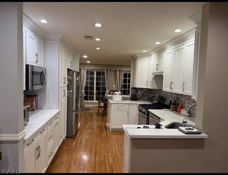 THIS LOVELY TOWNHOUSE offers a perfect blend of space and comfort.