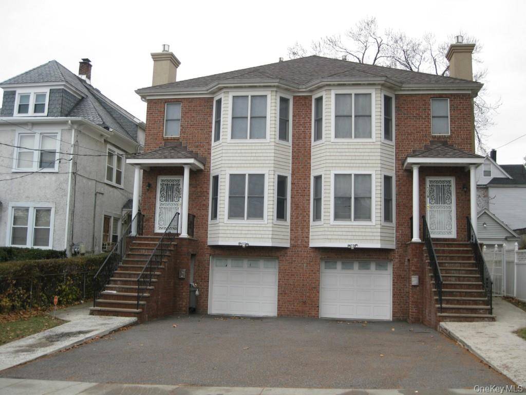 Beautiful newish extra large side by side duplex on tree lined street.