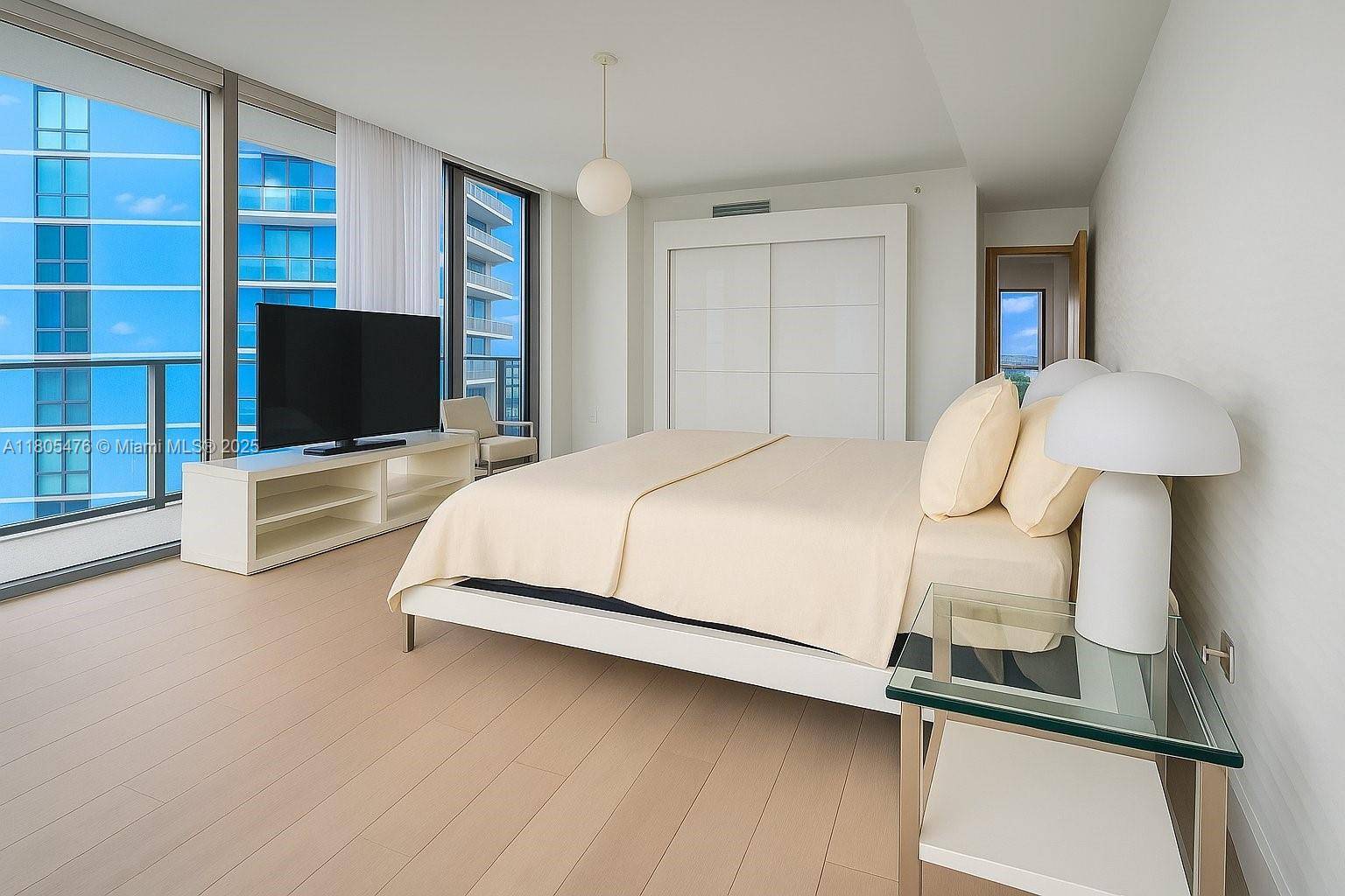 Breathtaking Bay amp ; Ocean Views Designer Residence with Expansive Wraparound Balcony Exceptional residence custom designed transforming the original 3 bedroom layout into a luxurious retreat featuring a dramatic and ...