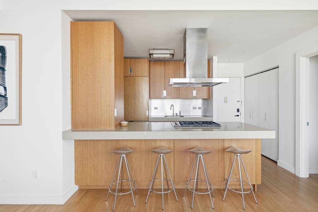 Perched on the 25th floor of The Caledonia, this exceptional two bedroom, two bathroom residence showcases sweeping skyline views from every room.