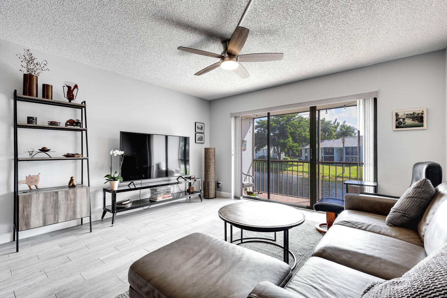AFFORDABLE, WATER FRONT, ALL AGES, GATED, ROOF 2024, 2 2, SECOND FLOOR, REMODELED TOP TO BOTTOM !