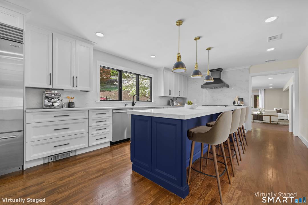 This fully reimagined Westover 4 bedroom luxury home offers turnkey living with high end design and exceptional natural light just minutes from downtown Stamford.