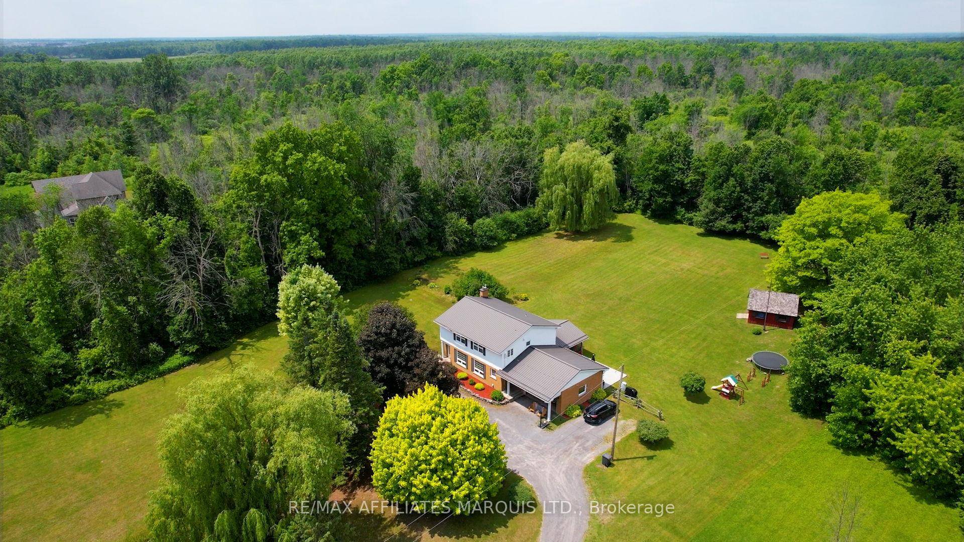 Welcome to this charming country retreat set on 2.