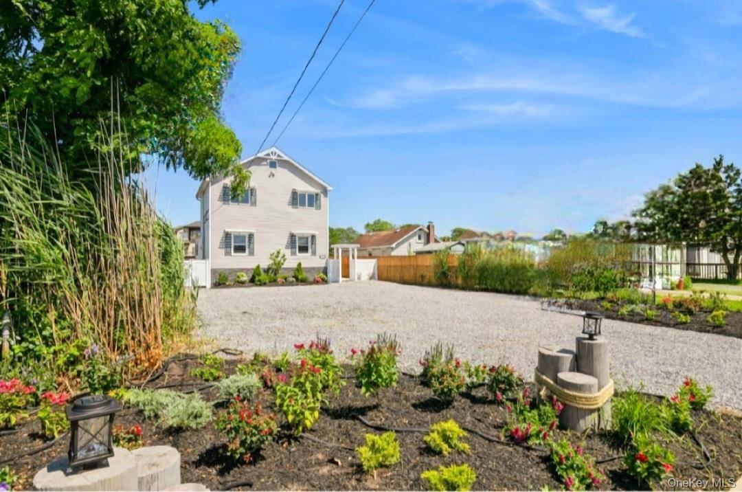 Welcome to this stunning, newly renovated waterfront home in Amityville It is a boating community and, it's a water lover's dream home w 50 ft.