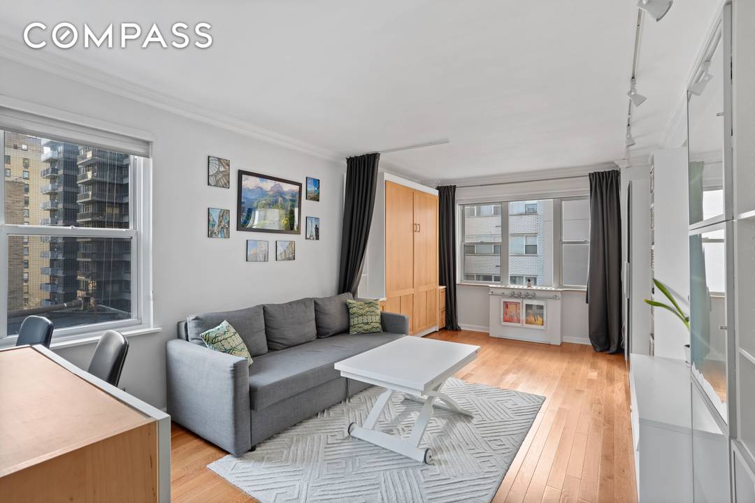 This impeccably renovated corner studio delivers light, design, and turnkey perfection in a full service doorman co op the kind of home that simply shows differently the moment you walk ...