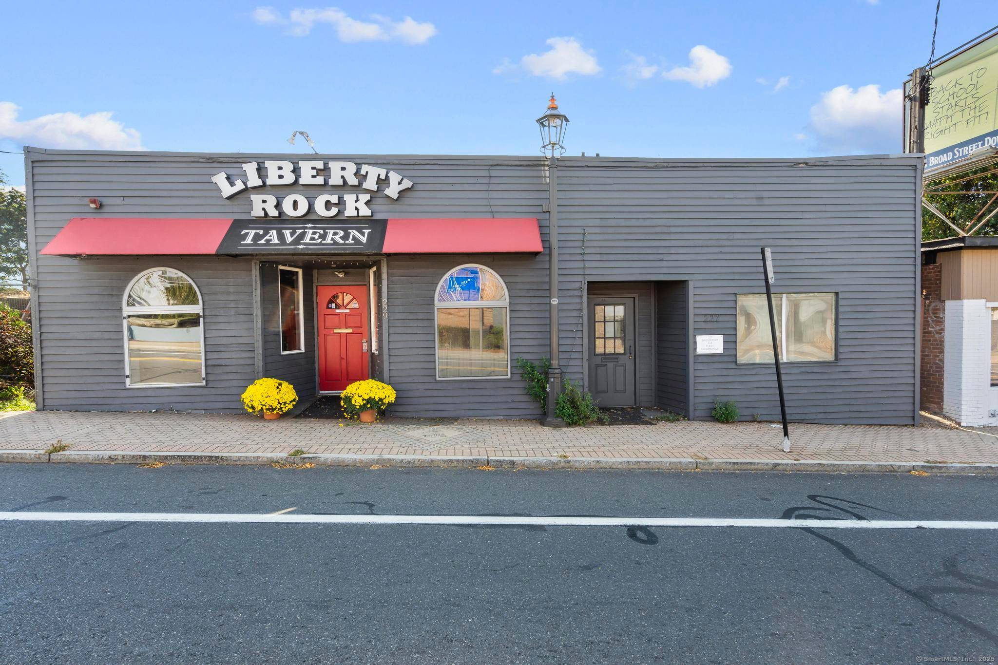 227 Bridgeport Avenue in Milford, CT presents a rare opportunity to acquire a fully operational restaurant with additional income and redevelopment potential.