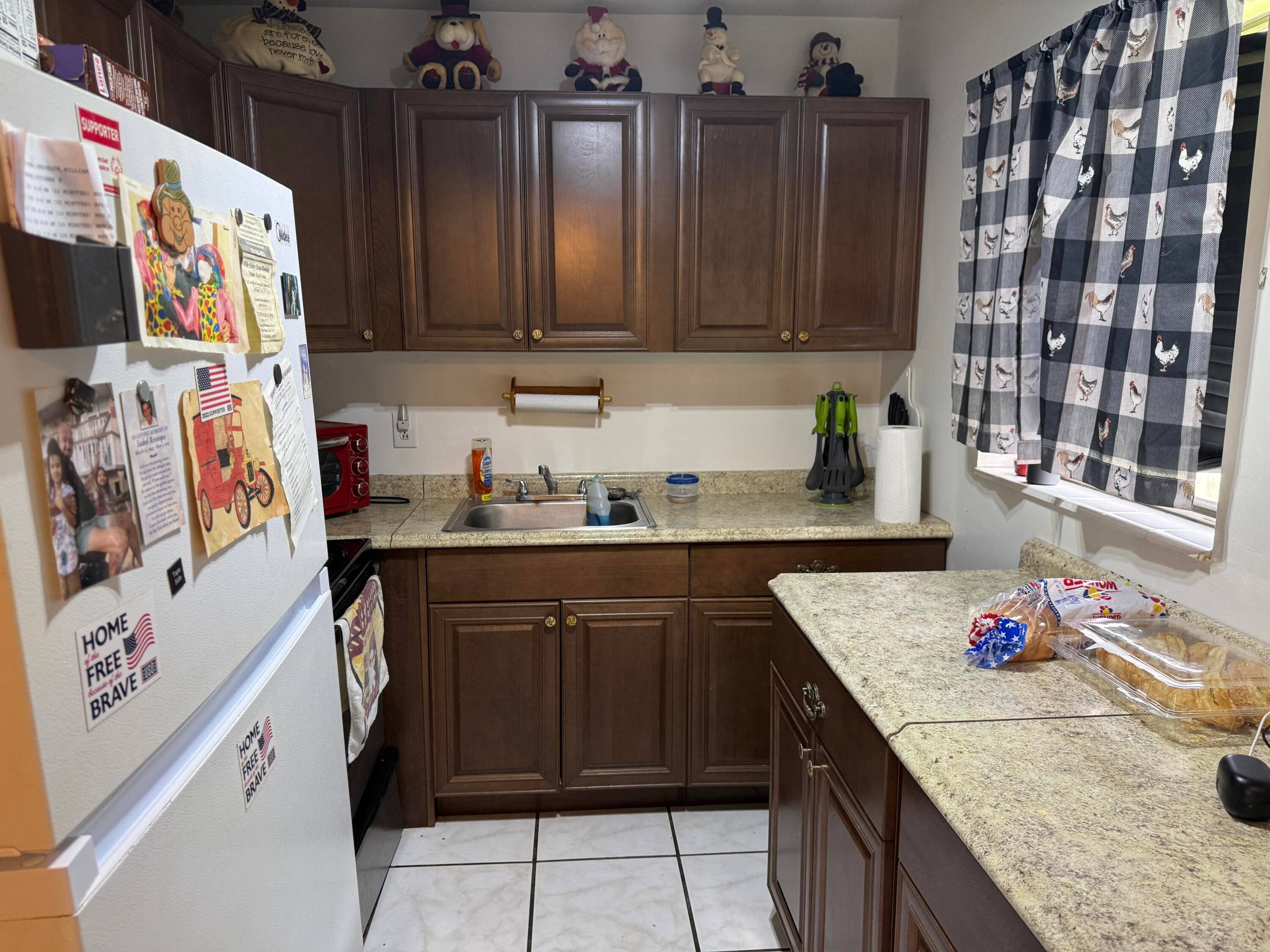 55 AND OVER COMMUNITY. Nice corner two bedroom condo with one and a half baths.