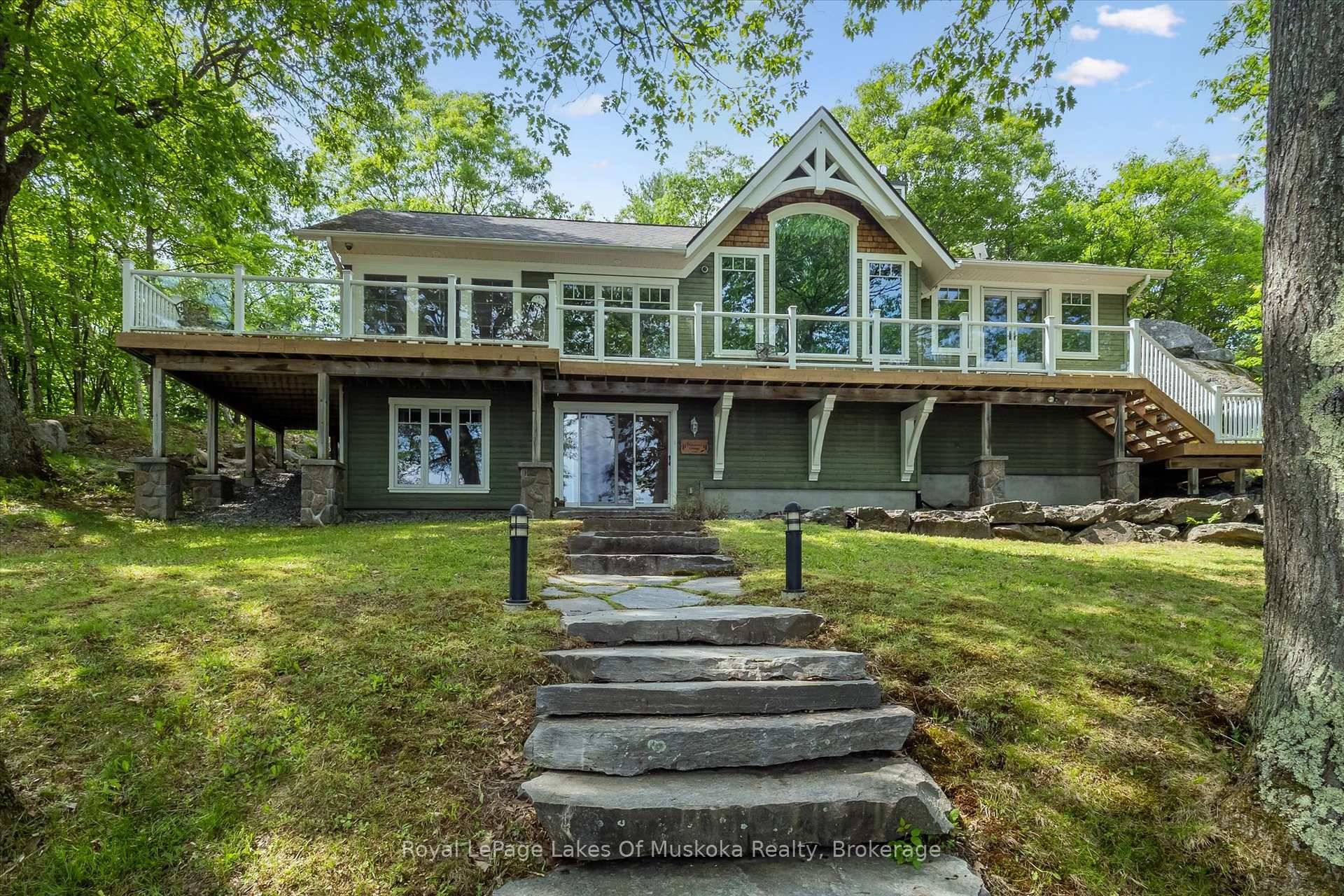 Discover your perfect retreat with this stunning 4 bedroom, 3 bathroom cottage home nestled on the tranquil shores of Mary Lake.