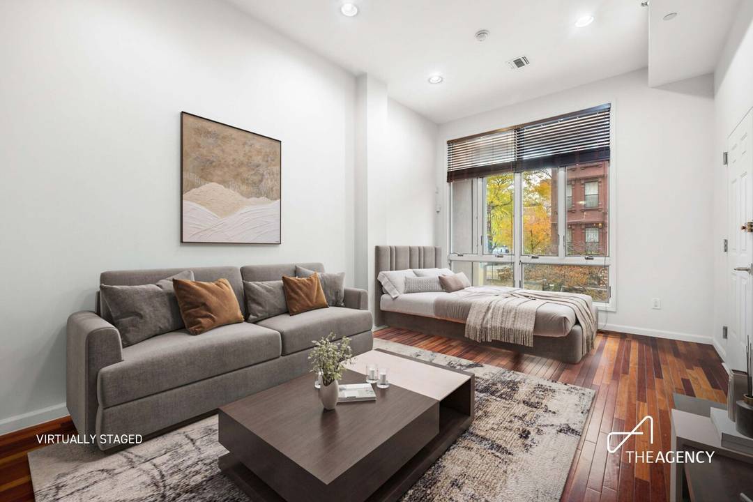 TAX ABATEMENT UNTIL 2032 PRIVATE STORAGE ROOM INCLUDED Experience modern comfort in this expansive, light filled studio featuring a full wall of south facing windows and soaring ceilings.