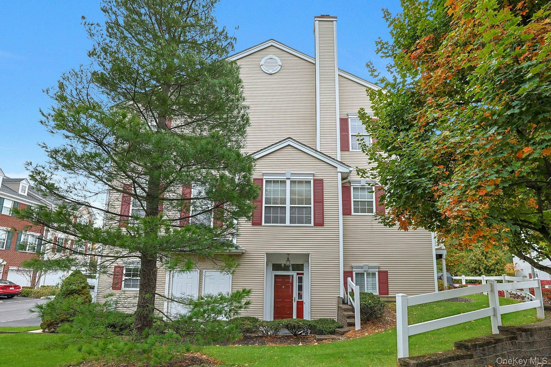 Sun Filled End Unit Townhouse in the Highly Desirable Amber Fields Community !