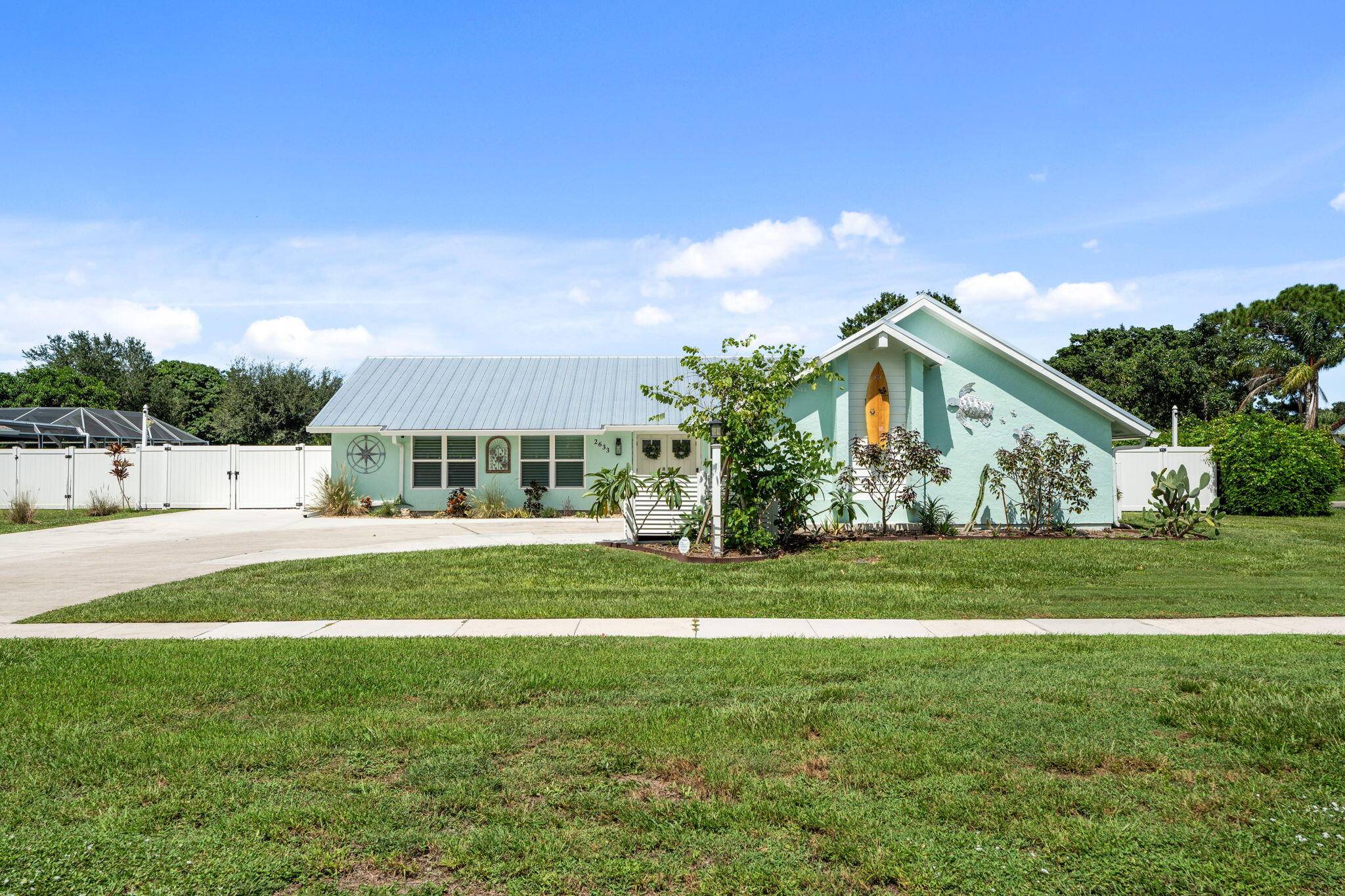Located in desirable Sandpiper Bay, this pristine 3 bedroom 2 bath home features an open floor plan, with kitchen dining living office area.