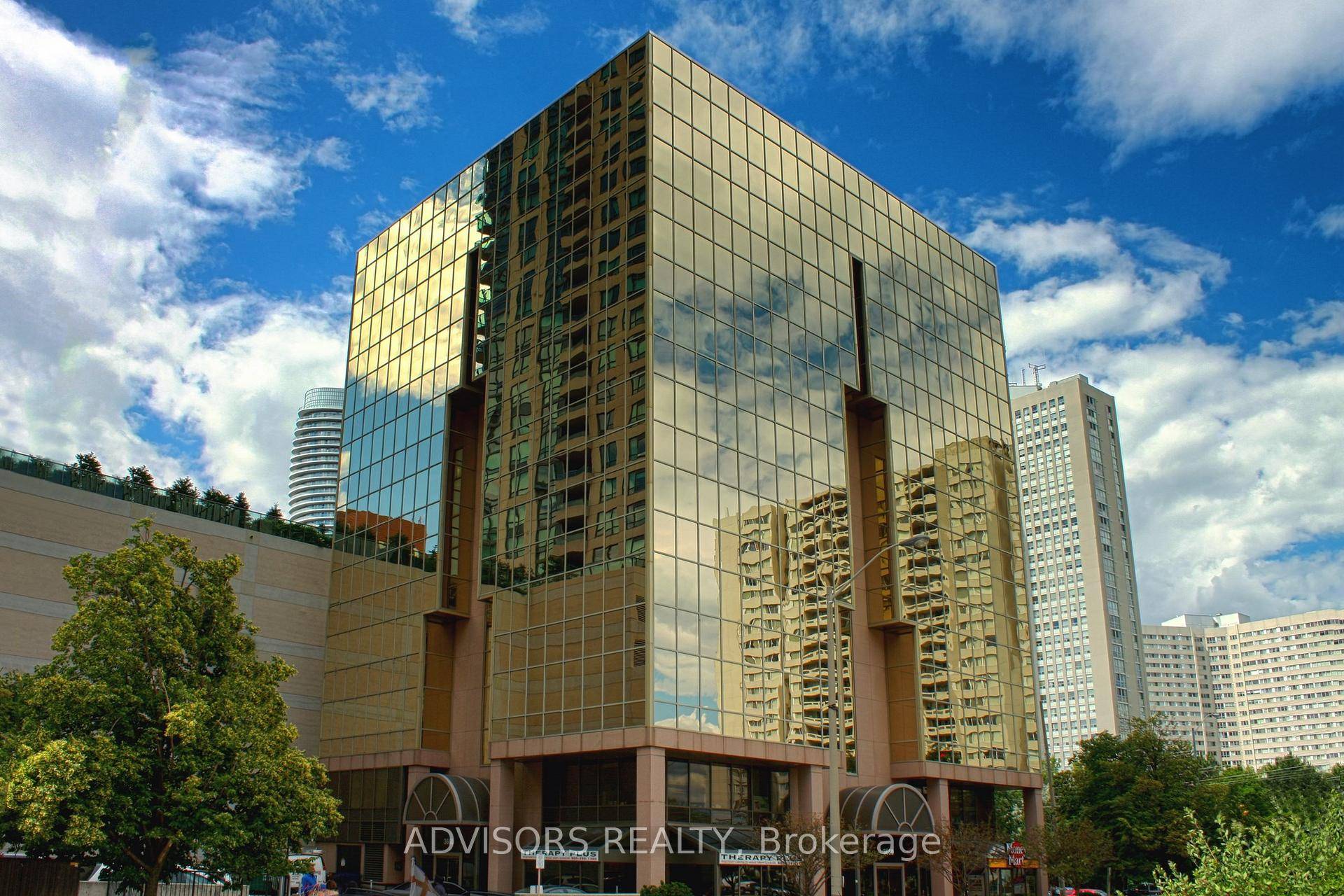 This office space boasts expansive glass windows along the walls, offering four private offices with stunning, unobstructed street views.