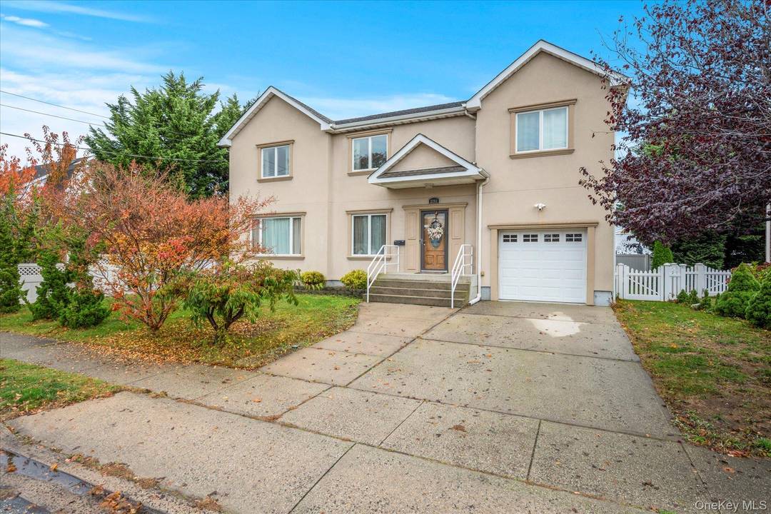 Discover this stunning, custom built colonial home nestled on a quiet tree lined street in the heart of Wantagh.