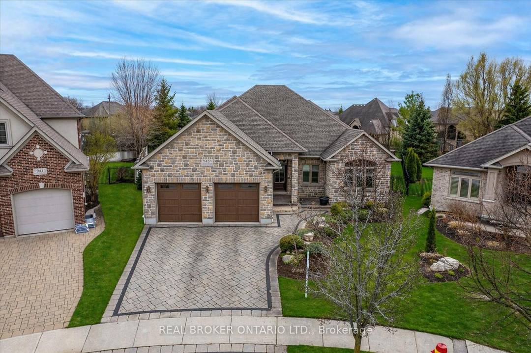 Set on a quiet cul de sac in Deer Ridge Estates, 945 Riverstone Drive sits on an expansive pie shaped lot of a third of an acre, where lots of ...