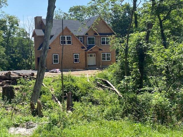 New Construction Colonial on 11 acres.