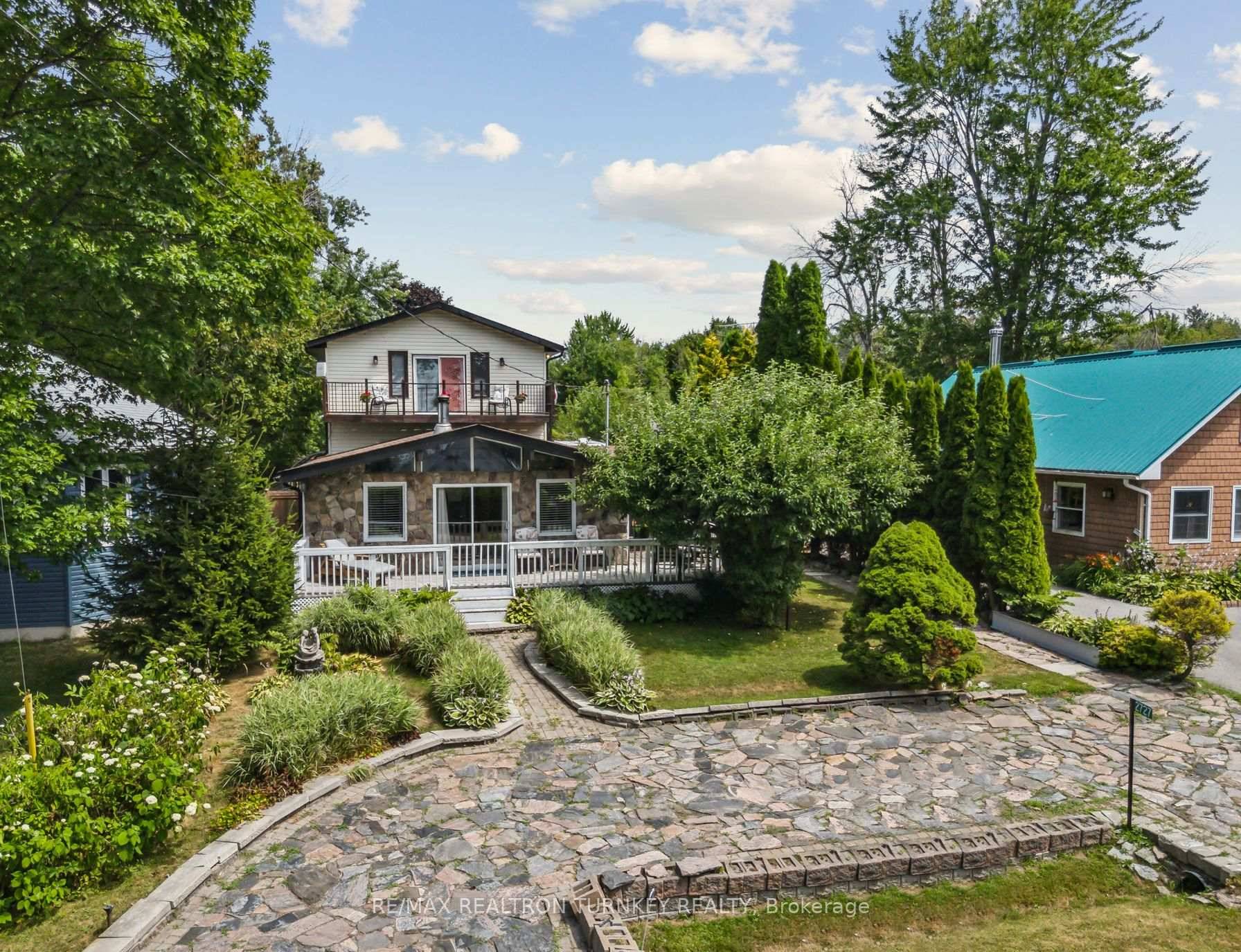 Welcome to 2727 Lone Birch Trail An incredibly rare opportunity just steps from Lake Simcoe !
