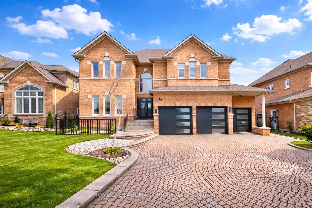 Luxurious 3 Car Garage Detached in prestigious Cachet Community.