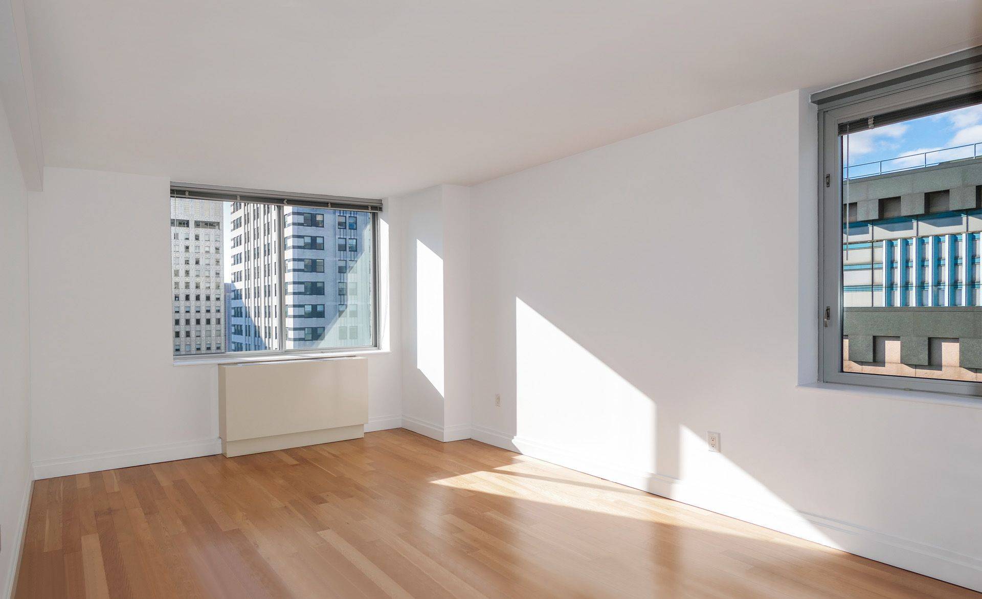 This stunning corner 1BR 1.