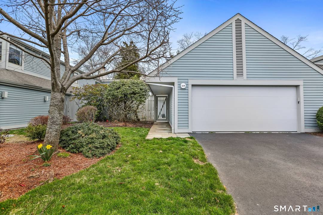 Beautifully updated with main level primary suite and abundant additional living space for family and guests in this move in ready townhouse.
