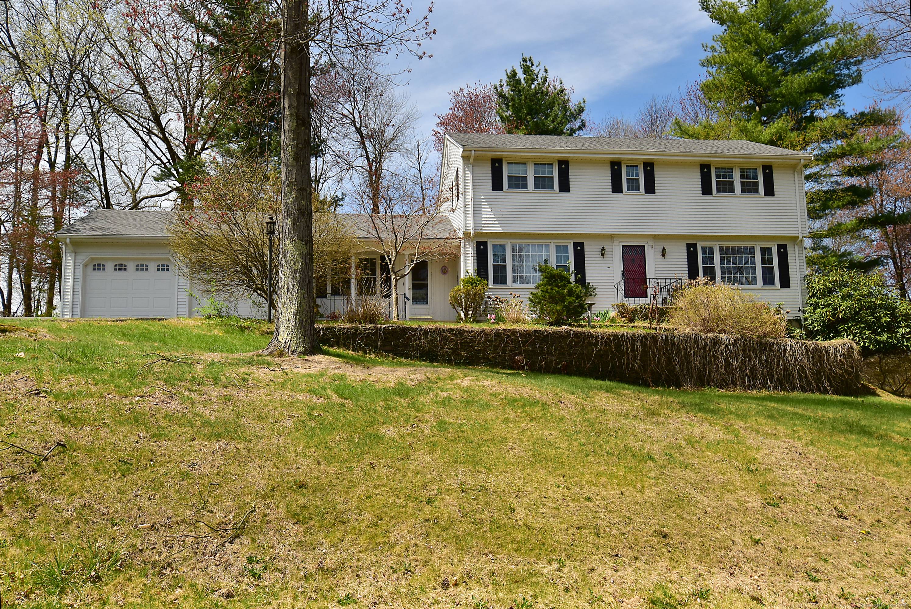 This charming Colonial home is nestled on over 3 4 of an acre, offering breathtaking views of the Traprock Ridge Land Conservatory.