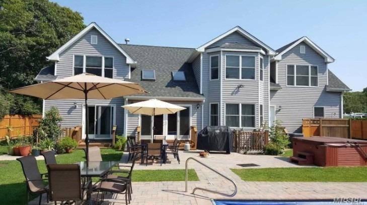 Steps away from the bay, this 3200 Sq.