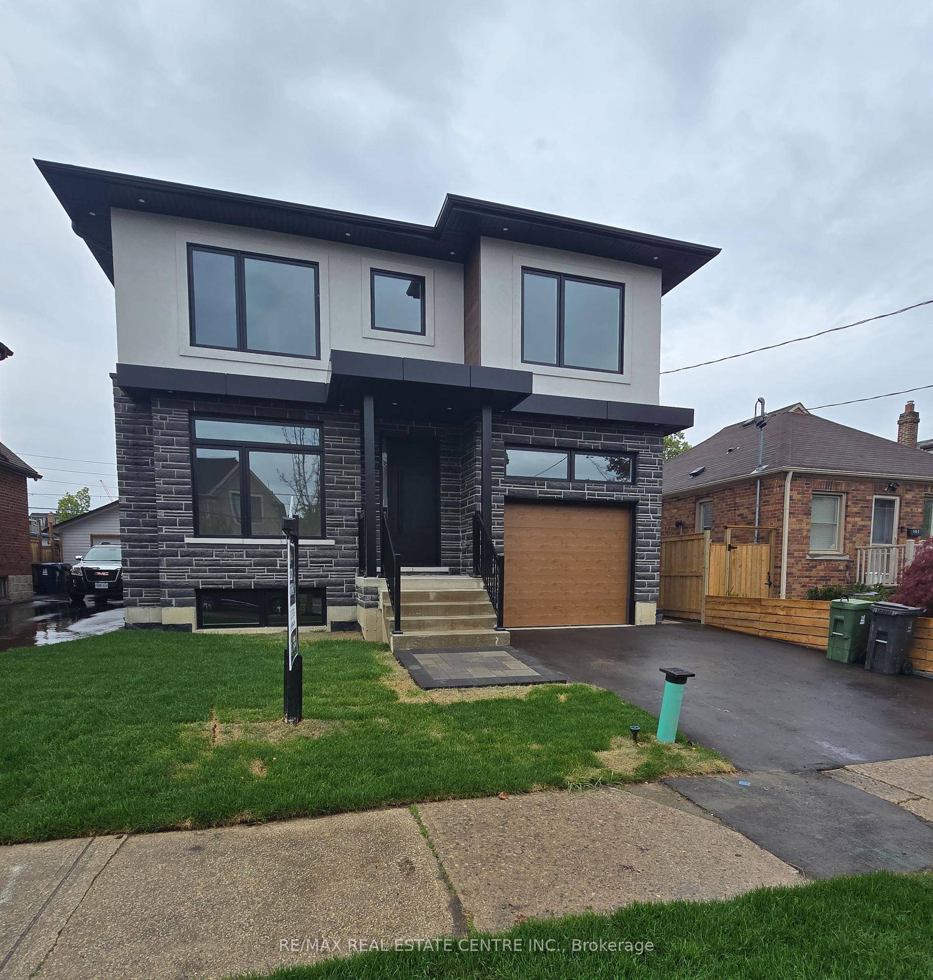 Welcome to 404 Melrose, an exceptional custom built residence offering modern luxury and thoughtful design in the heart of Mimico.