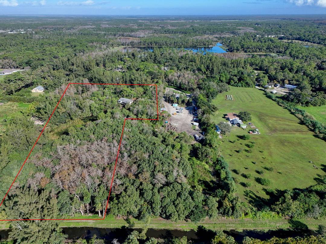 6. 09 acre lakefront property in highly desirable Jupiter Farms.