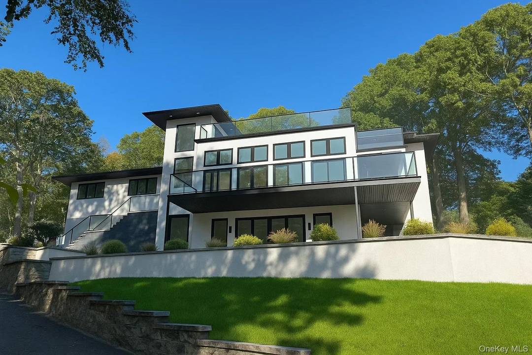 Welcome to 7 Riverview Terrace, an exceptional waterfront residence.