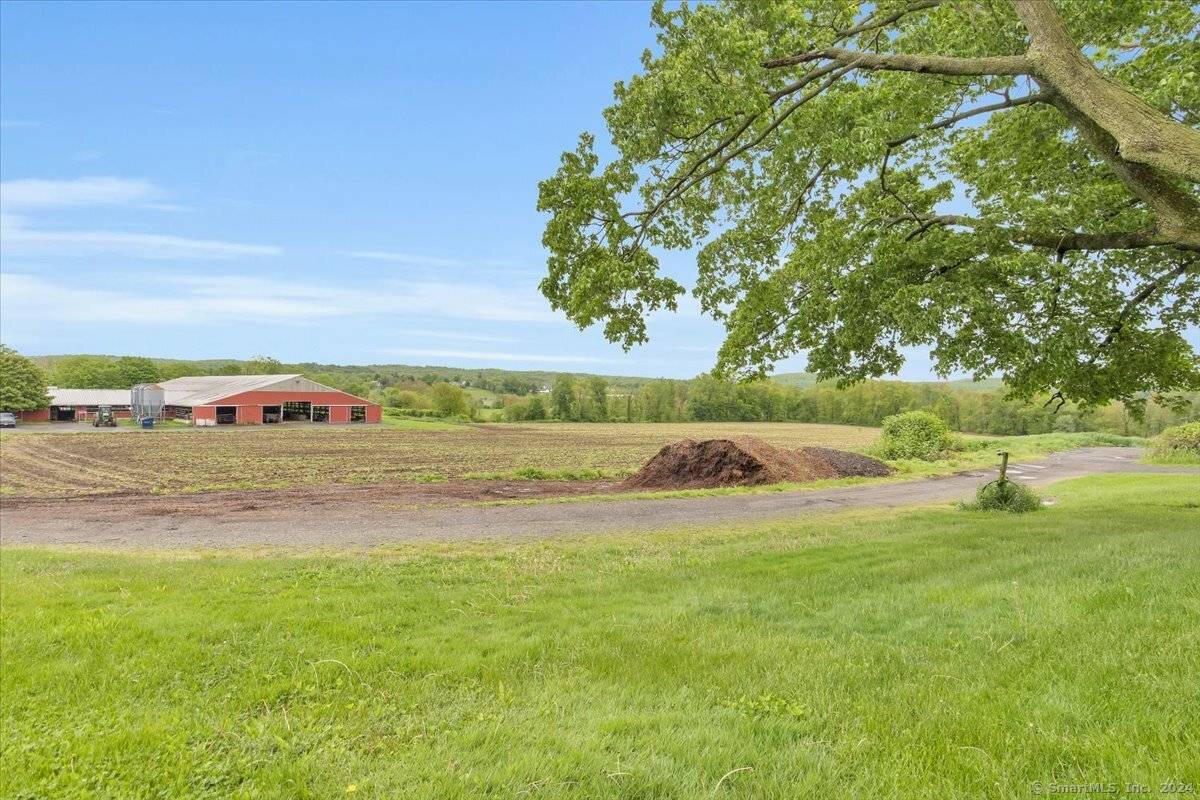 The Greenbacker's Brookfield Farm located midway between Hartford and New Haven in Durham Connecticut has two houses, dairy barn and many other outbuildings.